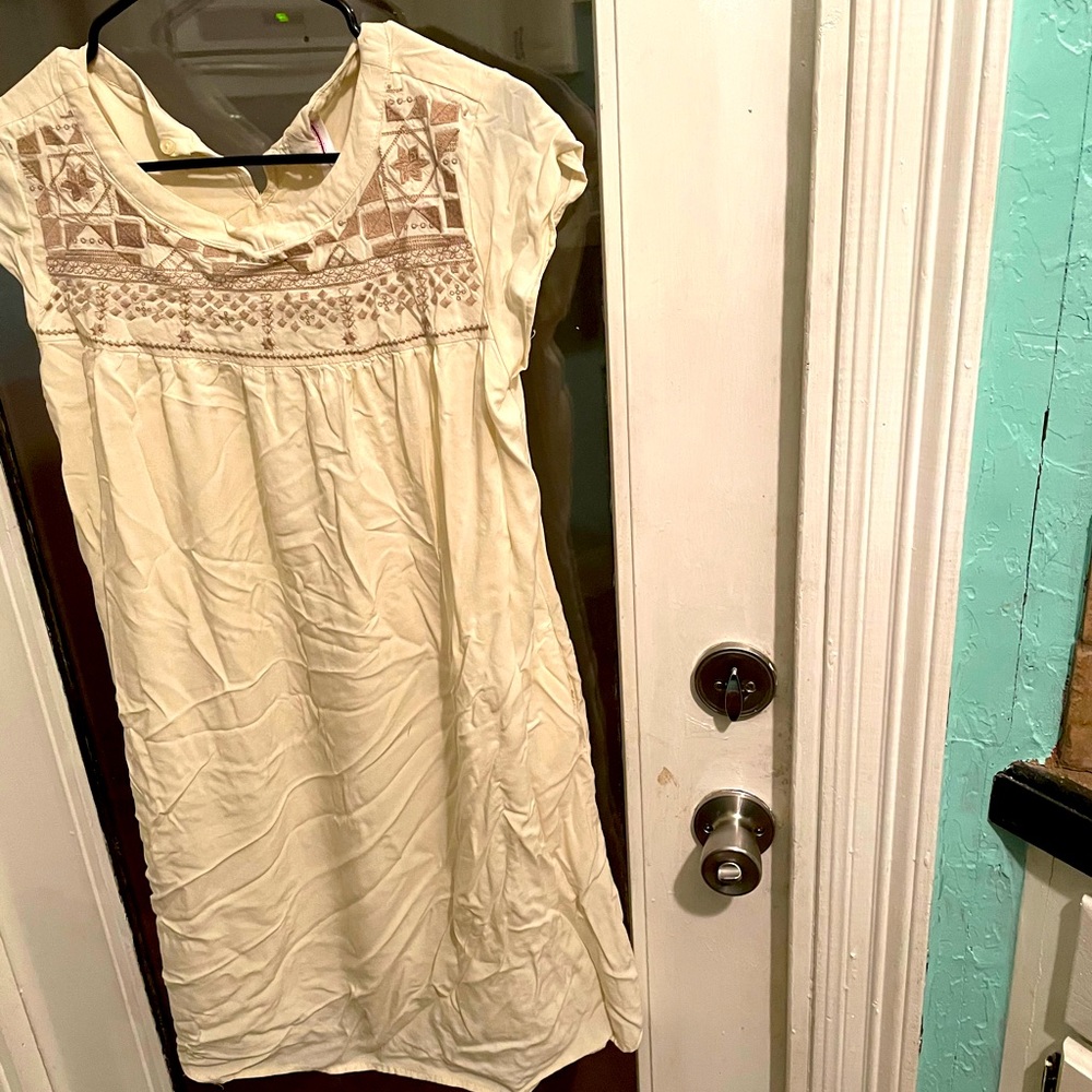 Cream. Worn once